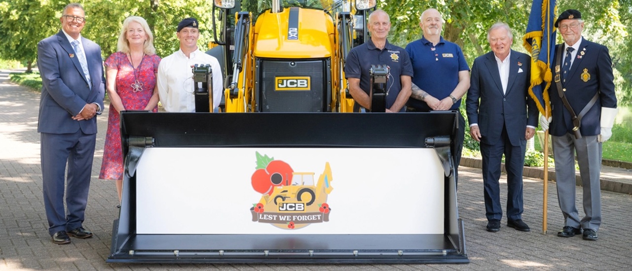 Retired firefighter digs deep for poppy appeal with JCB badge
